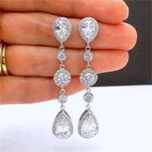 Load image into Gallery viewer, Luxury Bridal Earrings with Silver-Tone Setting and Clear Crystal Pear Design