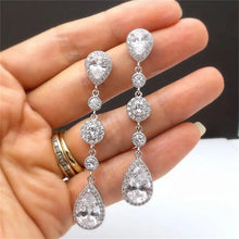 Load image into Gallery viewer, Luxury Bridal Earrings with Silver-Tone Setting and Clear Crystal Pear Design
