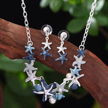 Load image into Gallery viewer, Beach Themed Necklace and Earring set in Sea Blue and Silver Colorations with Starfish Focals