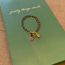 Load image into Gallery viewer, Double Strand 14Kt. Gold and Light Garnet Beads in Black Wire Wrapped chain with Ruby Colored Leaf Charm, Amethyst Swarovski Crystal and Pink Round Charms