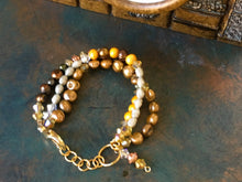 Load image into Gallery viewer, Fresh water pearl, swarovski crystal and rosegold colored beads in earth tones, triple strand bracelet.