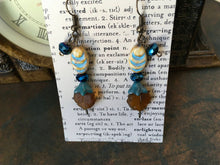 Load image into Gallery viewer, Czech Glass, Boho,Hand Crafted, Earrings in Blue/Cream Ceramic Beads with Robin's Egg Blue Colored Glass Flowers and Amber Colored Leaves