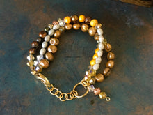 Load image into Gallery viewer, Fresh water pearl, swarovski crystal and rosegold colored beads in earth tones, triple strand bracelet.