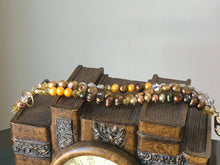Load image into Gallery viewer, Fresh water pearl, swarovski crystal and rosegold colored beads in earth tones, triple strand bracelet.