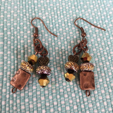Load image into Gallery viewer, Earrings, Hand Crafted, Amber Colored Beads with Hammered Metal Square Beads, Swarovski Crystals and heart shaped metal bead W/ Celtic Knot.