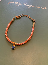 Load image into Gallery viewer, Single Strand Peach Colored Freshwater Pearl Bracelet with Sapphire Colored Crystal Charm and Paperclip Adjustable Chain

