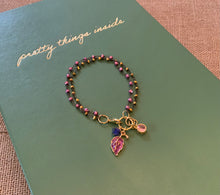 Load image into Gallery viewer, Double Strand 14Kt. Gold and Light Garnet Beads in Black Wire Wrapped chain with Ruby Colored Leaf Charm, Amethyst Swarovski Crystal and Pink Round Charms
