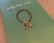 Load image into Gallery viewer, Double Strand 14Kt. Gold and Light Garnet Beads in Black Wire Wrapped chain with Ruby Colored Leaf Charm, Amethyst Swarovski Crystal and Pink Round Charms
