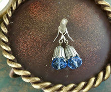 Load image into Gallery viewer, Whimsical, Vintage Style, blue crystal, faceted bead, drop earrings, with  silver tone, petal cover.
