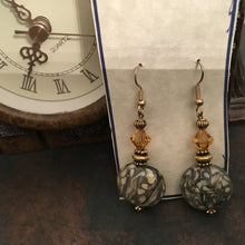 Load image into Gallery viewer, Fun N Funky, Handcrafted, Ceramic and Swarovski Drop Earrings in Earth Tone Grey Green and Cream Colorations. Gold Tone  Fish wire Earwire
