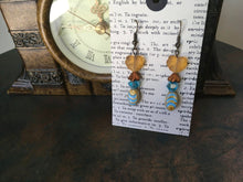 Load image into Gallery viewer, Czech Glass, Boho,Hand Crafted, Earrings in Blue/Cream Ceramic Beads with Copper Colored Glass Flowers and Frosted Amber Colored Leaves
