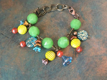 Load image into Gallery viewer, Fun N Funky, Handcrafted Bracelet with Mixed Beads of Czech Glass, Ceramic Beads and Glass Flowers  in Green, Blue, Lime &amp; Rust Colorations
