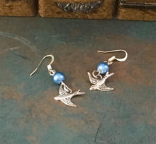 Load image into Gallery viewer, Whimsical, Vintage Style, Small Bluebird of Happiness, drop earrings, with bluish glass pearl, and bluebird in flight charm. Lead compliant.
