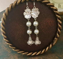 Load image into Gallery viewer, For the Bride, Vintage Style, Shimmering Creamy White Glass Pearls with Clear Lucite Lily drop and Silver Floral Charm.
