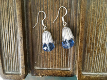 Load image into Gallery viewer, Whimsical, Vintage Style, blue crystal, faceted bead, drop earrings, with  silver tone, petal cover.
