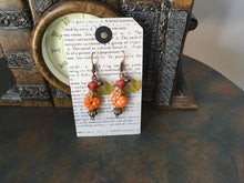 Load image into Gallery viewer, Czech Glass, Boho,Hand Crafted, Earrings in Sunburst Orange Czech Glass Beads W/ Copper Colored Glass Flowers and Frosted Czech Leaves
