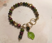 Load image into Gallery viewer, Feminine, Delicate, Handcrafted Bracelet, with Earthtone Czech Glass Beads, Sunburst Golden Beads, Green Glass Petal &amp; Copper Czech Drop
