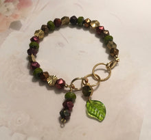 Load image into Gallery viewer, Feminine, Delicate, Handcrafted Bracelet, with Earthtone Czech Glass Beads, Sunburst Golden Beads, Green Glass Petal &amp; Copper Czech Drop
