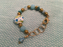 Load image into Gallery viewer, Fun N Funky, Handcrafted Bracelet with Mixed Beads of Czech Glass, Ceramic Beads, and drop Petal in Baby Blue Colorations
