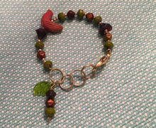 Load image into Gallery viewer, Feminine, Delicate, Handcrafted Bracelet, with Earth Tone Czech Glass, Goldtone Beads, Ceramic Bird &amp; Green Czech Glass Leaf Drop
