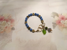 Load image into Gallery viewer, Feminine, Delicate, Handcrafted Bracelet, with Beach Blue Czech Glass, Golden Sunburst Bead, &amp; Crystal Drop
