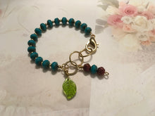 Load image into Gallery viewer, Feminine, Delicate, Handcrafted Bracelet, with Capri Blue Czech Glass, Petite Golden Beads, Green Glass Petal &amp; Copper Czech Drop
