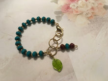 Load image into Gallery viewer, Feminine, Delicate, Handcrafted Bracelet, with Capri Blue Czech Glass, Petite Golden Beads, Green Glass Petal &amp; Copper Czech Drop
