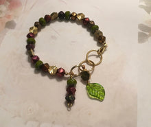 Load image into Gallery viewer, Feminine, Delicate, Handcrafted Bracelet, with Earthtone Czech Glass Beads, Sunburst Golden Beads, Green Glass Petal &amp; Copper Czech Drop
