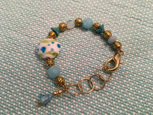 Load image into Gallery viewer, Fun N Funky, Handcrafted Bracelet with Mixed Beads of Czech Glass, Ceramic Beads, and drop Petal in Baby Blue Colorations
