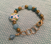 Load image into Gallery viewer, Fun N Funky, Handcrafted Bracelet with Mixed Beads of Czech Glass, Ceramic Beads, and drop Petal in Baby Blue Colorations
