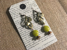 Load image into Gallery viewer, Czech Glass, Boho, Handcrafted, Lime Green Bead, Brass Filigree Leaf and Dainty Glass Flower in metallic Colorations
