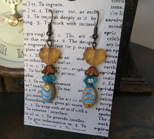 Load image into Gallery viewer, Czech Glass, Boho,Hand Crafted, Earrings in Blue/Cream Ceramic Beads with Copper Colored Glass Flowers and Frosted Amber Colored Leaves
