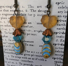 Load image into Gallery viewer, Czech Glass, Boho,Hand Crafted, Earrings in Blue/Cream Ceramic Beads with Copper Colored Glass Flowers and Frosted Amber Colored Leaves
