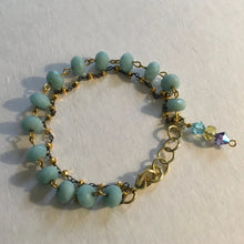 Load image into Gallery viewer, Delicate and feminine, double layered, robin’s egg blue beaded chain &amp; 18K gold beaded chain, w/ aqua colored Swarovski crystal drop
