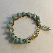 Load image into Gallery viewer, Delicate and feminine, double layered, robin’s egg blue beaded chain &amp; 18K gold beaded chain, w/ aqua colored Swarovski crystal drop
