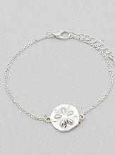 Load image into Gallery viewer, Delicate, Beach Themed Sand Dollar Charm Bracelet in Gold or Silver Tones
